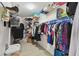 Large walk-in closet with ample shelving and hanging space at 152 Travis Ln, Davenport, FL 33837