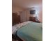 King-size bedroom with coastal bedding and ample space at 11301 Huggins St, Leesburg, FL 34788