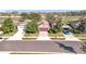 Aerial view of single-Gathering homes with well-maintained landscaping in a suburban neighborhood at 22004 Belgian Ct, Mount Dora, FL 32757