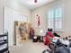 Bedroom featuring shuttered windows, and an abstract art piece at 22004 Belgian Ct, Mount Dora, FL 32757