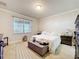 Comfortable bedroom featuring a queen-sized bed, soft lighting, and a serene atmosphere at 22004 Belgian Ct, Mount Dora, FL 32757