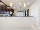 View of kitchen with stainless steel appliances and granite countertops at 22004 Belgian Ct, Mount Dora, FL 32757
