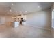 Open concept eat-in kitchen with an island, granite countertops, and stainless appliances at 633 Highfalls Ave, Debary, FL 32713