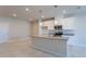Open concept kitchen with an island, granite countertops, and stainless appliances at 633 Highfalls Ave, Debary, FL 32713