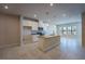 Bright kitchen featuring an island with bar seating, granite countertops, and stainless appliances at 633 Highfalls Ave, Debary, FL 32713