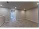 Cozy loft with neutral carpeting and recessed lighting at 633 Highfalls Ave, Debary, FL 32713
