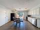 Bright kitchen and dining area with stainless steel appliances and a sliding glass door to the yard at 1531 Ne 38Th St, Ocala, FL 34479