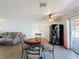 The open layout connects the living and dining areas, with a sliding door accessing outdoor space at 1531 Ne 38Th St, Ocala, FL 34479