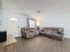 Living room featuring a new white door, blue walls and a cozy sitting chair at 1531 Ne 38Th St, Ocala, FL 34479