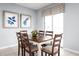 Cozy dining area with a large window and elegant decor at 355 Biltmore Blvd, Dundee, FL 33838