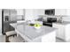 Spacious kitchen island with sleek countertops, perfect for entertaining guests at 355 Biltmore Blvd, Dundee, FL 33838