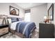 This bedroom features a football theme and a sporty aesthetic with a gray carpet at 1624 Covey Rise Ter, Winter Haven, FL 33884