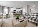 Inviting living space featuring an open floor plan, modern decor, and comfortable seating arrangements at 1624 Covey Rise Ter, Winter Haven, FL 33884