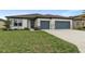 Charming single-Gathering home featuring a well-manicured lawn and a two-car garage at 9773 Sw 63Rd Loop, Ocala, FL 34481