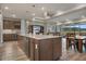 Open concept kitchen with a spacious island that overlooks a casual dining area and Gathering room at 9773 Sw 63Rd Loop, Ocala, FL 34481