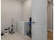 Storage room with tile floor, and white freezer at 9773 Sw 63Rd Loop, Ocala, FL 34481