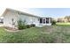Spacious backyard with screened in porch at 17975 Se 106Th Ct, Summerfield, FL 34491