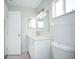 Bathroom features white vanity, modern lighting, and stylish mirror at 17975 Se 106Th Ct, Summerfield, FL 34491