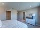 Calming bedroom features a large dresser with a round mirror and access to a walk-in closet at 678 Four Leaf Ave, Debary, FL 32713