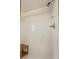 Walk-in shower featuring stylish tiles, a comfortable bench, and modern fixtures at 12 Almond Ter, Ocala, FL 34472
