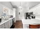 Efficient kitchen featuring white cabinets and modern appliances at 12 Almond Ter, Ocala, FL 34472