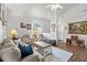 Comfortable living room featuring an open concept and neutral decor at 12 Almond Ter, Ocala, FL 34472