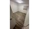 Bedroom featuring new floors, neutral walls, and a window for natural light at 722 E Michigan St # 145, Orlando, FL 32806