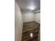 Comfortable bedroom with new floors, neutral walls, a large window for natural light, and modern light fixture at 722 E Michigan St # 145, Orlando, FL 32806