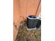 View of an outdoor HVAC unit surrounded by leaves at 722 E Michigan St # 145, Orlando, FL 32806