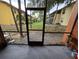 Screened-in patio area with outdoor views at 722 E Michigan St # 145, Orlando, FL 32806