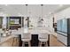 Spacious kitchen with island seating, modern appliances, and an open-concept layout at 8750 Sw 79Th Loop, Ocala, FL 34481