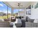 Relaxing screened porch with comfortable wicker seating and outdoor views at 8750 Sw 79Th Loop, Ocala, FL 34481