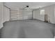 Spacious two-car garage featuring a sealed floor and an automatic door at 20995 Sw 93Rd Lane Rd, Dunnellon, FL 34431