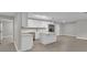 Open floor plan kitchen and living area with an island and modern appliances at 20995 Sw 93Rd Lane Rd, Dunnellon, FL 34431