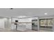 Bright kitchen with white cabinetry, stainless steel appliances, and an island at 20995 Sw 93Rd Lane Rd, Dunnellon, FL 34431
