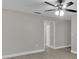 Living room featuring neutral colors and a ceiling fan with light at 20995 Sw 93Rd Lane Rd, Dunnellon, FL 34431