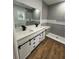 Modern bathroom with double vanity and stylish tiled walk-in shower at 36702 Calhoun Rd, Eustis, FL 32736