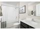 Well-lit bathroom features a shower-tub, toilet, and vanity, creating a functional and stylish space at 4208 Cattail Marsh Dr, Lakeland, FL 33811