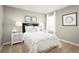 Cozy bedroom with neutral tones, plush carpet, and bright natural light from large windows at 4208 Cattail Marsh Dr, Lakeland, FL 33811