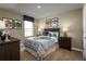 Inviting bedroom with themed decor, comfortable furnishings, and ample natural light at 4208 Cattail Marsh Dr, Lakeland, FL 33811