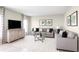 Inviting living room with neutral tones, plush seating, and decorative accents for a comfortable atmosphere at 4208 Cattail Marsh Dr, Lakeland, FL 33811