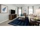 Inviting living room with stylish furniture, a plush rug, and tasteful wall art, creating a welcoming ambiance at 4220 Cattail Marsh Dr, Lakeland, FL 33811