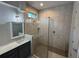 Well-lit bathroom with modern sink and stylish glass-enclosed shower, providing a luxurious and comfortable space at 1567 Lake Reserve Dr, Deland, FL 32724