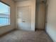 Carpeted room with a closet at 1567 Lake Reserve Dr, Deland, FL 32724