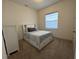 Inviting bedroom with cozy bed and drawer storage at 1567 Lake Reserve Dr, Deland, FL 32724