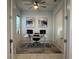 Bright office space with a modern desk, dual monitors, and neutral decor at 1567 Lake Reserve Dr, Deland, FL 32724