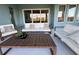 Relaxing patio with comfortable seating, providing a cozy outdoor space for entertaining and leisure at 1567 Lake Reserve Dr, Deland, FL 32724