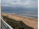 Relaxing ocean views with a scenic beach can be seen from the balcony at 1425 Ocean Shore Blvd # 402, Ormond Beach, FL 32176