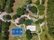 Aerial view of park featuring a playground, basketball court and sand volleyball court at 3317 Grande Heron Dr, St Cloud, FL 34773