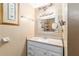Bathroom featuring vanity, mirror, and shelving at 3200 Se 34Th St, Ocala, FL 34471